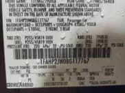 ✅ 2011 Ford Taurus Limited • VIN: 1FAHP2JW0BG117767 • Lot: 66070925. Listed on Copart with 113,736 mi. Free auction sales archive from the USA and detailed vehicle history report at DreamBid. Image 12.