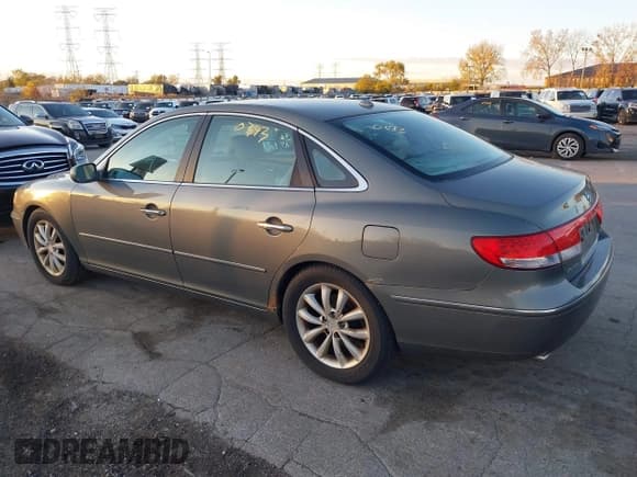 ✅ 2007 Hyundai Azera SE • VIN: KMHFC46F77A194403 • Lot: 43650343. Listed on IAAI with 148,624 mi. Free auction sales archive from the USA and detailed vehicle history report at DreamBid. Image 3.