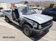✅ 1989 Toyota Pickup DX • VIN: JT4RN81P0K0034316 • Лот: 61264255. Опубликован ранее на Copart с пробегом 223 865 миль. Бесплатный доступ к архиву аукционных продаж из США и подробный отчёт об истории автомобиля на DreamBid. Изображение 4.