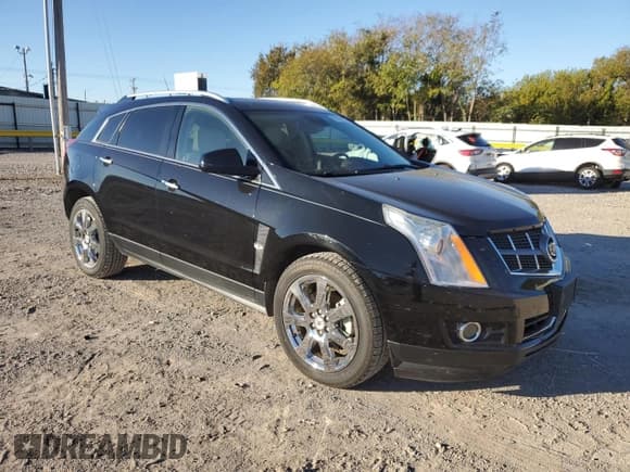 ✅ 2012 Cadillac SRX Performance Collection • VIN: 3GYFNBE33CS646165 • Lot: 90860355. Wystawiony na Copart z przebiegiem 157 539 mil. Bezpłatny archiwum sprzedaży aukcyjnych z USA i szczegółowy raport historii pojazdu na DreamBid. Zdjęcie 4.