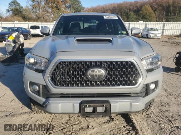 ✅ 2019 Toyota Tacoma SR • VIN: 3TMCZ5ANXKM200636 • Lot: 91264635. Listed on Copart with 127,616 mi. Free auction sales archive from the USA and detailed vehicle history report at DreamBid. Image 5.