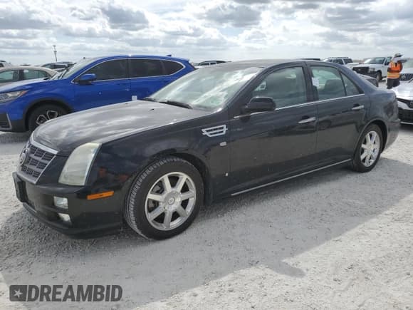 ✅ 2009 Cadillac STS RWD • VIN: 1G6DW67V690134595 • Лот: 76619544. Опубликован ранее на Copart с пробегом Не указан. Бесплатный доступ к архиву аукционных продаж из США и подробный отчёт об истории автомобиля на DreamBid. Изображение 1.