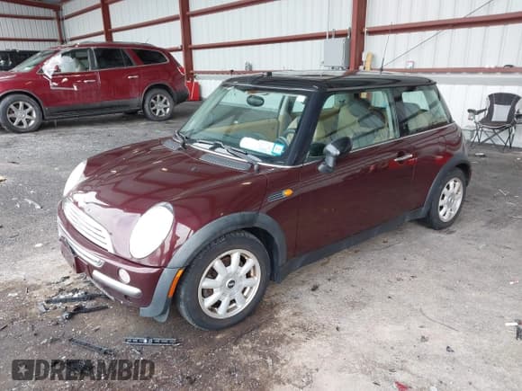 ✅ 2003 MINI Hardtop • VIN: WMWRC33473TC39868 • Lot: 41279678. Listed on IAAI with 162,005 mi. Free auction sales archive from the USA and detailed vehicle history report at DreamBid. Image 2.