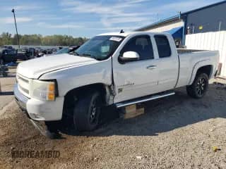 2010 Chevrolet Silverado 1500 LT with VIN 1GCSKSE35AZ255631, listed as a Copart auction lot 84522075 with 127,750 mi miles and Salvage title. Bid and sale history available at DreamBid. Image 1.