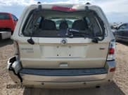 ✅ 2011 Mercury Mariner Premier • VIN: 4M2CN8HG3BKJ06796 • Lot: 66446235. Listed on Copart with 92,834 mi. Free auction sales archive from the USA and detailed vehicle history report at DreamBid. Image 6.