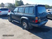 ✅ 1996 Toyota Land Cruiser • VIN: JT3HJ85J4T0138939 • Lot: 42852334. Wystawiony na IAAI z przebiegiem 156 874 mil. Bezpłatny archiwum sprzedaży aukcyjnych z USA i szczegółowy raport historii pojazdu na DreamBid. Zdjęcie 3.