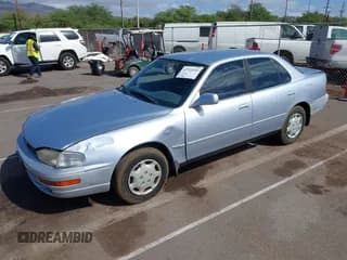 ✅ 1994 Toyota Camry LE • VIN: JT2SK12E0R0268022 • Лот: 43723142. Опубликован ранее на IAAI с пробегом 142 942 миль. Бесплатный доступ к архиву аукционных продаж из США и подробный отчёт об истории автомобиля на DreamBid. Изображение 2.