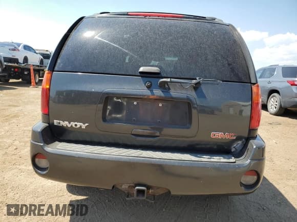 ✅ 2004 GMC Envoy SLE • VIN: 1GKDT13S842134104 • Лот: 68589425. Опубликован ранее на Copart с пробегом 171 126 миль. Бесплатный доступ к архиву аукционных продаж из США и подробный отчёт об истории автомобиля на DreamBid. Изображение 6.