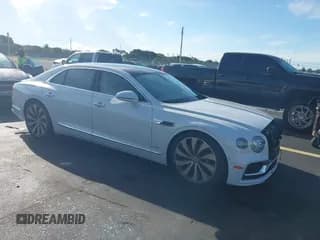 ✅ 2020 Bentley Flying Spur W12 • VIN: SCBBB6ZG7LC080974 • Lot: 43296914. Wystawiony na IAAI z przebiegiem 16 621 mil. Bezpłatny archiwum sprzedaży aukcyjnych z USA i szczegółowy raport historii pojazdu na DreamBid. Zdjęcie 1.