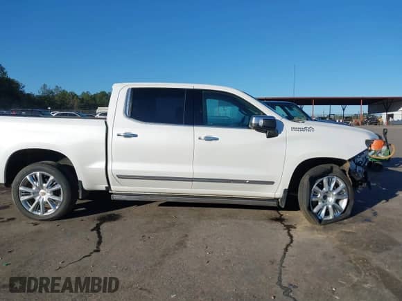 2024 Chevrolet Silverado 1500 High Country с VIN 1GCUDJED5RZ220704, выставлен на аукционе IAAI как лот 41225916 с пробегом 23 540 миль миль и . История ставок и продаж доступна на DreamBid. Изображение 14.