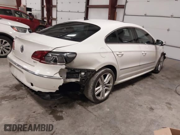 ✅ 2014 Volkswagen CC Executive • VIN: WVWRP7AN9EE519502 • Lot: 41458158. Listed on IAAI with 85,988 mi. Free auction sales archive from the USA and detailed vehicle history report at DreamBid. Image 4.