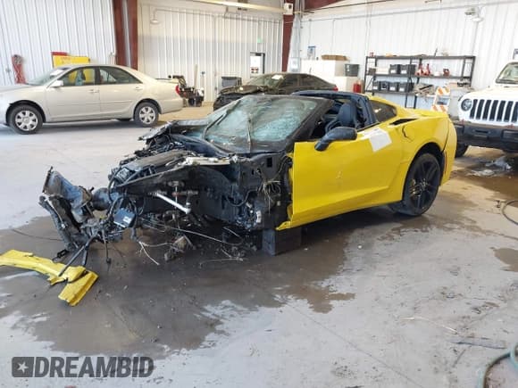 ✅ 2014 Chevrolet Corvette Z51 3LT • VIN: 1G1YL2D74E5106127 • Lot: 43217458. Wystawiony na IAAI z przebiegiem Nie podano. Bezpłatny archiwum sprzedaży aukcyjnych z USA i szczegółowy raport historii pojazdu na DreamBid. Zdjęcie 2.