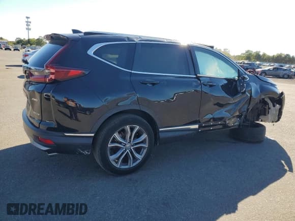 ✅ 2020 Honda CR-V Touring • VIN: 2HKRW2H92LH612695 • Lot: 84559165. Wystawiony na Copart z przebiegiem 62 150 mil. Bezpłatny archiwum sprzedaży aukcyjnych z USA i szczegółowy raport historii pojazdu na DreamBid. Zdjęcie 3.