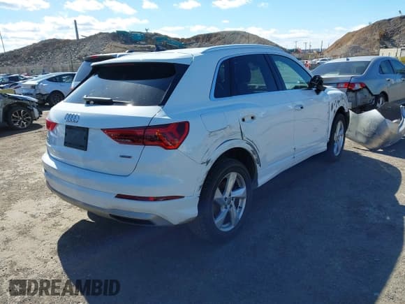 ✅ 2019 Audi Q3 Premium • VIN: WA1AECF37K1077089 • Лот: 41742732. Опубликован ранее на IAAI с пробегом 61 038 миль. Бесплатный доступ к архиву аукционных продаж из США и подробный отчёт об истории автомобиля на DreamBid. Изображение 4.