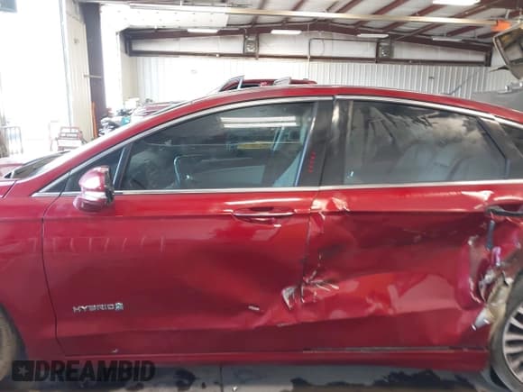 ✅ 2017 Ford Fusion Hybrid Titanium • VIN: 3FA6P0RUXHR158259 • Лот: 42463561. Опубликован ранее на IAAI с пробегом 206 211 миль. Бесплатный доступ к архиву аукционных продаж из США и подробный отчёт об истории автомобиля на DreamBid. Изображение 14.