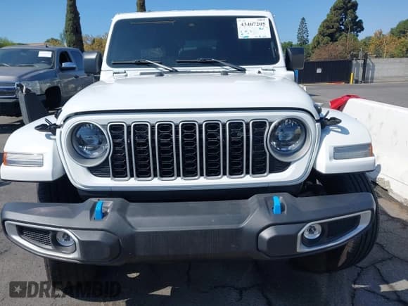 ✅ 2024 Jeep Wrangler Sahara • VIN: 1C4RJXP62RW255492 • Lot: 43407205. Listed on IAAI with 15,649 mi. Free auction sales archive from the USA and detailed vehicle history report at DreamBid. Image 11.