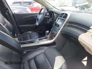 2013 Chevrolet Malibu LT z VIN 1G11E5SAXDF178485, wystawiony jako IAAI lot #43399346 z przebiegiem 143 805 mil mil oraz . Historia ofert i sprzedaży dostępna na DreamBid. Obrazek 5.