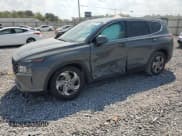 ✅ 2021 Hyundai Santa Fe SE • VIN: 5NMS14AJ6MH320868 • Lot: 80922815. Listed on Copart with 107,410 mi. Free auction sales archive from the USA and detailed vehicle history report at DreamBid. Image 1.