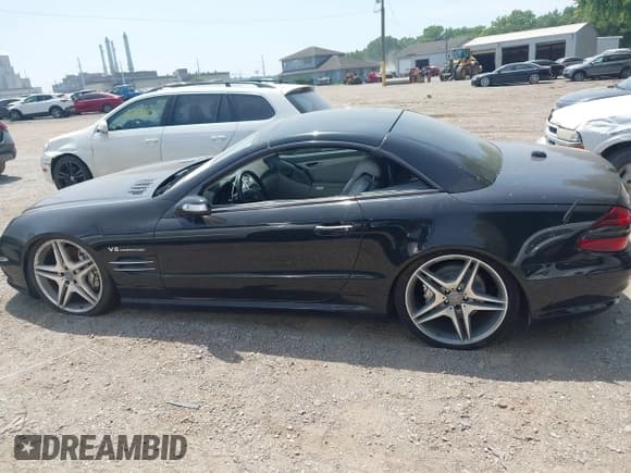 ✅ 2005 Mercedes-Benz SL 55 AMG • VIN: WDBSK74F85F101039 • Lot: 42812397. Listed on IAAI with 76,452 mi. Free auction sales archive from the USA and detailed vehicle history report at DreamBid. Image 14.