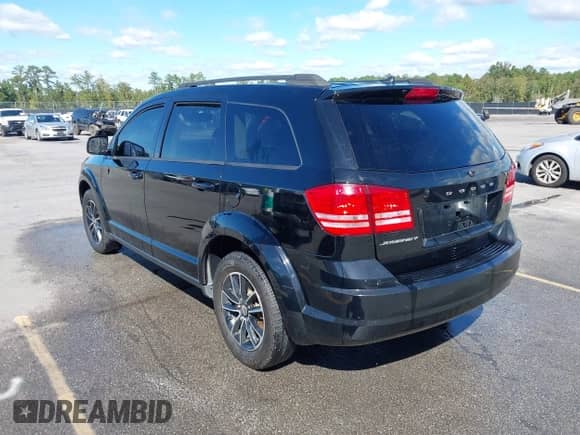 2017 Dodge Journey SE z VIN 3C4PDCAB4HT630221, wystawiony jako IAAI lot #43423577 z przebiegiem 126 030 mil mil oraz . Historia ofert i sprzedaży dostępna na DreamBid. Obrazek 3.