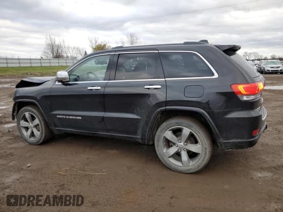 ✅ 2015 Jeep Grand Cherokee Overland • VIN: 1C4RJFCM4FC706109 • Lot: 81279744. Listed on Copart with 160,295 mi. Free auction sales archive from the USA and detailed vehicle history report at DreamBid. Image 2.