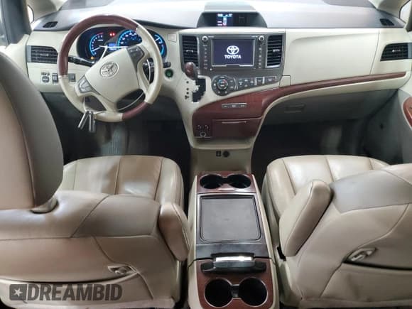 ✅ 2012 Toyota Sienna XLE AAS • VIN: 5TDYK3DC1CS268494 • Lot: 71156765. Listed on Copart with 98,544 mi. Free auction sales archive from the USA and detailed vehicle history report at DreamBid. Image 8.