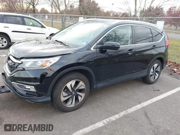 ✅ 2015 Honda CR-V Touring • VIN: 5J6RM4H9XFL130777 • Лот: 43522733. Опубликован ранее на IAAI с пробегом 87 722 миль. Бесплатный доступ к архиву аукционных продаж из США и подробный отчёт об истории автомобиля на DreamBid. Изображение 17.