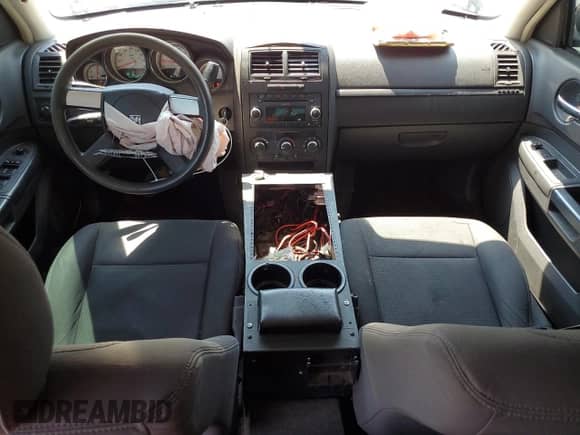 2009 Dodge Charger Police с VIN 2B3KA43T49H536981, выставлен на аукционе Copart как лот 54721694 с пробегом 160 508 миль миль и Списание • Salvage title. История ставок и продаж доступна на DreamBid. Изображение 8.