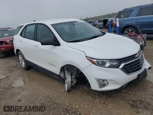 ✅ 2018 Chevrolet Equinox LS • VIN: 2GNAXREV0J6225799 • Lot: 90907535. Listed on Copart with 123,465 mi. Free auction sales archive from the USA and detailed vehicle history report at DreamBid. Image 4.