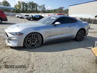 ✅ 2021 Ford Mustang GT • VIN: 1FA6P8CF4M5138322 • Lot: 80683095. Listed on Copart with 32,063 mi. Free auction sales archive from the USA and detailed vehicle history report at DreamBid. Image 1.