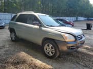 ✅ 2008 Kia Sportage LX • VIN: KNDJF723987507503 • Lot: 69040095. Listed on Copart with 164,137 mi. Free auction sales archive from the USA and detailed vehicle history report at DreamBid. Image 4.