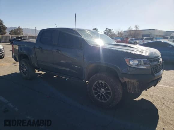 ✅ 2019 Chevrolet Colorado 4WD ZR2 • VIN: 1GCGTEENXK1338557 • Лот: 82151483. Опубликован ранее на Copart с пробегом 57 180 миль. Бесплатный доступ к архиву аукционных продаж из США и подробный отчёт об истории автомобиля на DreamBid. Изображение 4.