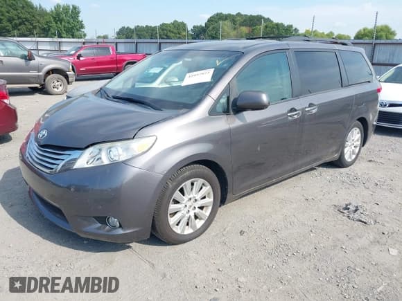 ✅ 2012 Toyota Sienna XLE AAS • VIN: 5TDYK3DC4CS236655 • Lot: 42957972. Listed on IAAI with 124,420 mi. Free auction sales archive from the USA and detailed vehicle history report at DreamBid. Image 2.