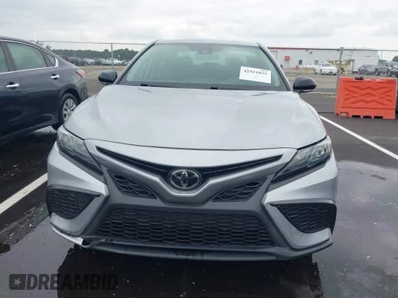 2022 Toyota Camry SE z VIN 4T1T11AK1NU064964, wystawiony jako IAAI lot #42921035 z przebiegiem 107 000 mil mil oraz . Historia ofert i sprzedaży dostępna na DreamBid. Obrazek 13.