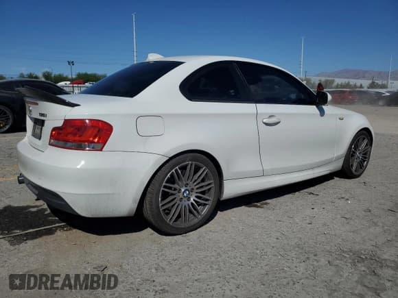 ✅ 2012 BMW 1 Series 135i • VIN: WBAUC9C51CVM12873 • Lot: 80400775. Listed on Copart with 150,923 mi. Free auction sales archive from the USA and detailed vehicle history report at DreamBid. Image 3.