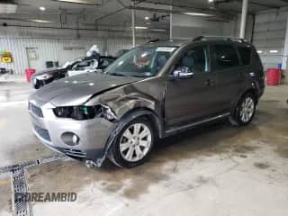2012 Mitsubishi Outlander SE z VIN JA4JT3AW3CU015874, wystawiony jako Copart lot #69943005 z przebiegiem 139 747 mil mil oraz Szkoda całkowita • Salvage title. Historia ofert i sprzedaży dostępna na DreamBid. Obrazek 1.