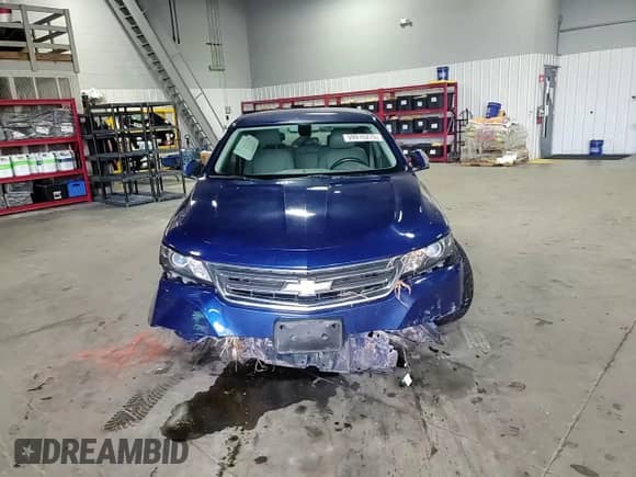 2014 Chevrolet Impala LT with VIN 1G1125S32EU119745, listed as a Copart auction lot 59915375 with 69,140 mi miles and Salvage title. Bid and sale history available at DreamBid. Image 13.