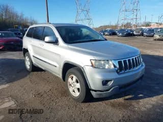 ✅ 2012 Jeep Grand Cherokee Laredo • VIN: 1C4RJFAG9CC185557 • Lot: 43787014. Wystawiony na IAAI z przebiegiem 195 839 mil. Bezpłatny archiwum sprzedaży aukcyjnych z USA i szczegółowy raport historii pojazdu na DreamBid. Zdjęcie 1.