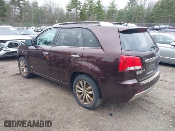 ✅ 2012 Kia Sorento SX • VIN: 5XYKWDA23CG202604 • Lot: 43674761. Listed on IAAI with 143,323 mi. Free auction sales archive from the USA and detailed vehicle history report at DreamBid. Image 3.