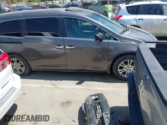 ✅ 2012 Honda Odyssey EX-L • VIN: 5FNRL5H63CB036727 • Lot: 42605463. Listed on IAAI with 179,407 mi. Free auction sales archive from the USA and detailed vehicle history report at DreamBid. Image 13.