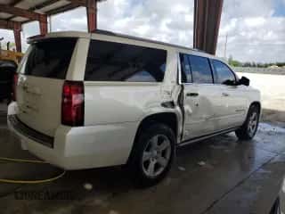 2015 Chevrolet Suburban LTZ z VIN 1GNSKKKC9FR678117, wystawiony jako Copart lot #70138934 z przebiegiem 136 271 mil mil oraz Szkoda całkowita • Salvage title. Historia ofert i sprzedaży dostępna na DreamBid. Obrazek 3.