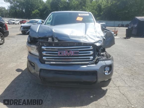 ✅ 2018 GMC Canyon 2WD SLE • VIN: 1GTG5CEN0J1253420 • Лот: 60665475. Опубликован ранее на Copart с пробегом 98 384 миль. Бесплатный доступ к архиву аукционных продаж из США и подробный отчёт об истории автомобиля на DreamBid. Изображение 5.