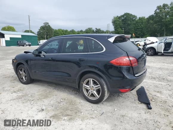 ✅ 2014 Porsche Cayenne • VIN: WP1AA2A21ELA92785 • Lot: 56255925. Listed on Copart with 116,925 mi. Free auction sales archive from the USA and detailed vehicle history report at DreamBid. Image 2.