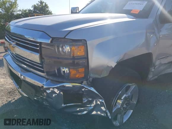 2018 Chevrolet Silverado 2500HD Work Truck z VIN 1GC2KUEGXJZ336462, wystawiony jako IAAI lot #43456042 z przebiegiem 162 564 mil mil oraz . Historia ofert i sprzedaży dostępna na DreamBid. Obrazek 6.