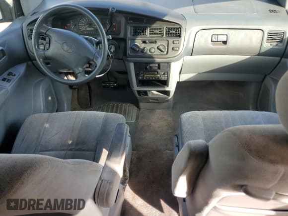 ✅ 1999 Toyota Sienna CE • VIN: 4T3GF19C1XU151919 • Lot: 93457615. Wystawiony na Copart z przebiegiem 248 564 mil. Bezpłatny archiwum sprzedaży aukcyjnych z USA i szczegółowy raport historii pojazdu na DreamBid. Zdjęcie 8.