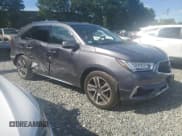 ✅ 2018 Acura MDX Advance • VIN: 5J8YD4H84JL004384 • Lot: 65694325. Listed on Copart with 59,189 mi. Free auction sales archive from the USA and detailed vehicle history report at DreamBid. Image 4.