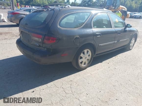 ✅ 2003 Ford Taurus • VIN: 1FAFP59S13A217651 • Lot: 43130709. Listed on IAAI with 148,062 mi. Free auction sales archive from the USA and detailed vehicle history report at DreamBid. Image 4.