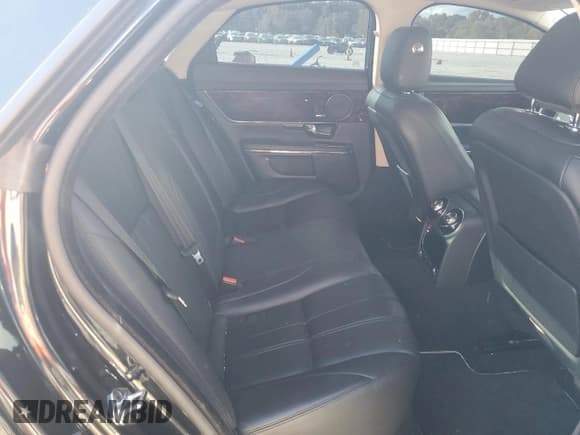 ✅ 2013 Jaguar XJ • VIN: SAJWA1C78D8V57155 • Лот: 86630925. Опубликован ранее на Copart с пробегом 80 547 миль. Бесплатный доступ к архиву аукционных продаж из США и подробный отчёт об истории автомобиля на DreamBid. Изображение 10.