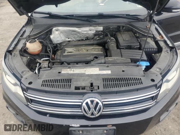 ✅ 2012 Volkswagen Tiguan SE • VIN: WVGAV7AX1CW602168 • Lot: 61219265. Listed on Copart with 130,702 mi. Free auction sales archive from the USA and detailed vehicle history report at DreamBid. Image 12.