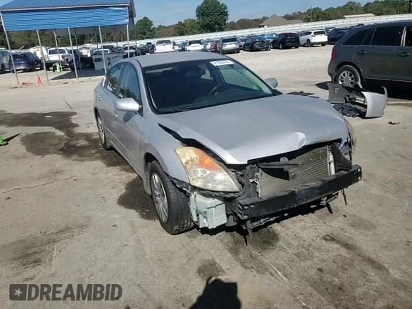 ✅ 2009 Nissan Altima S • VIN: 1N4AL21E99C106658 • Lot: 91722035. Listed on Copart with 199,654 mi. Free auction sales archive from the USA and detailed vehicle history report at DreamBid. Image 14.